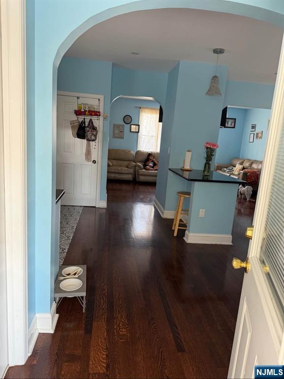 380 Semel Avenue Garfield, NJ 07026 - Photo 5 of 19 a living room with furniture and wooden floor