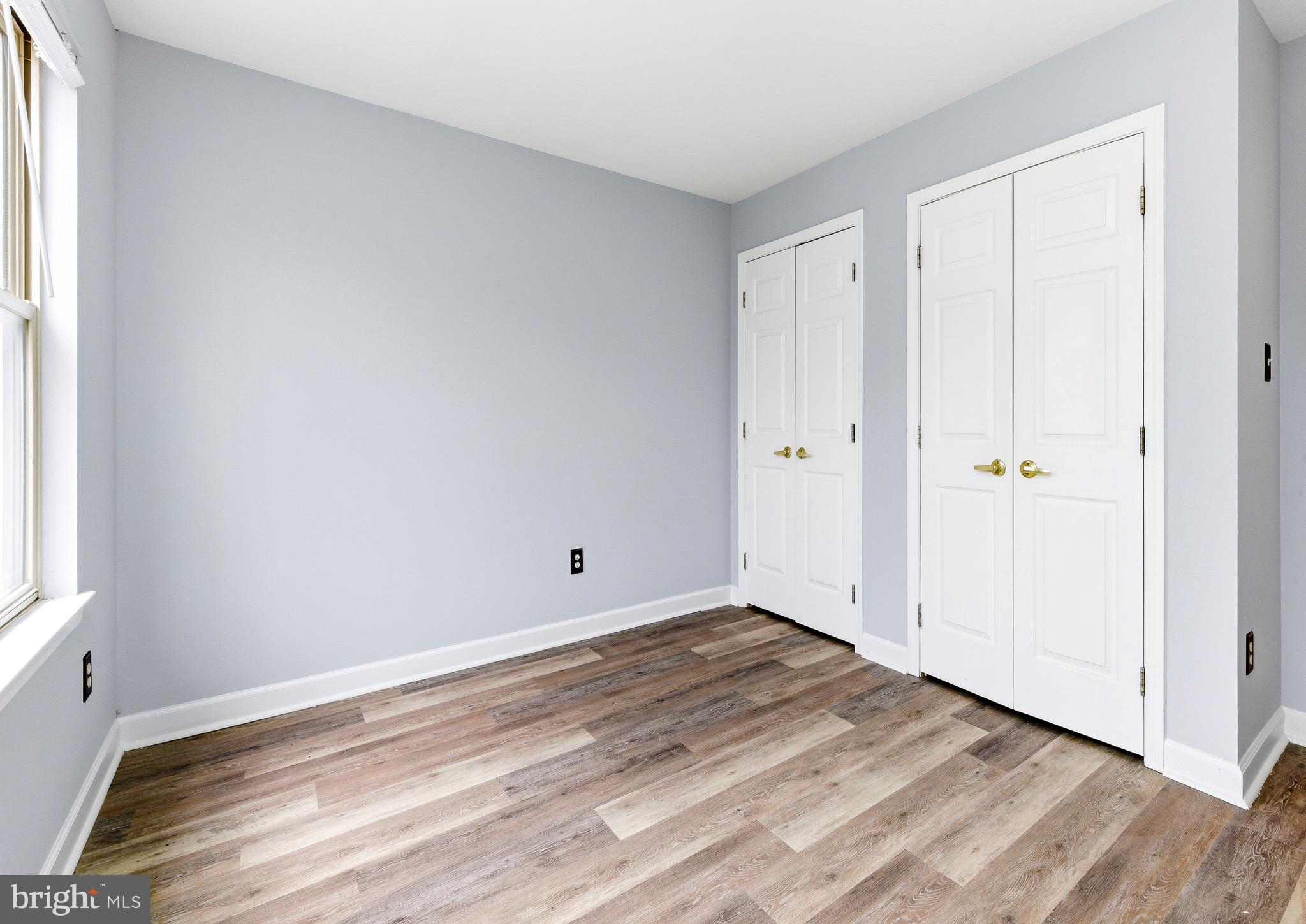 576 Washington Street Camden, NJ 08103 - Photo 14 of 25 wooden floor in an empty room