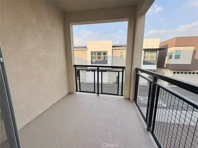 a view of a hallway with windows