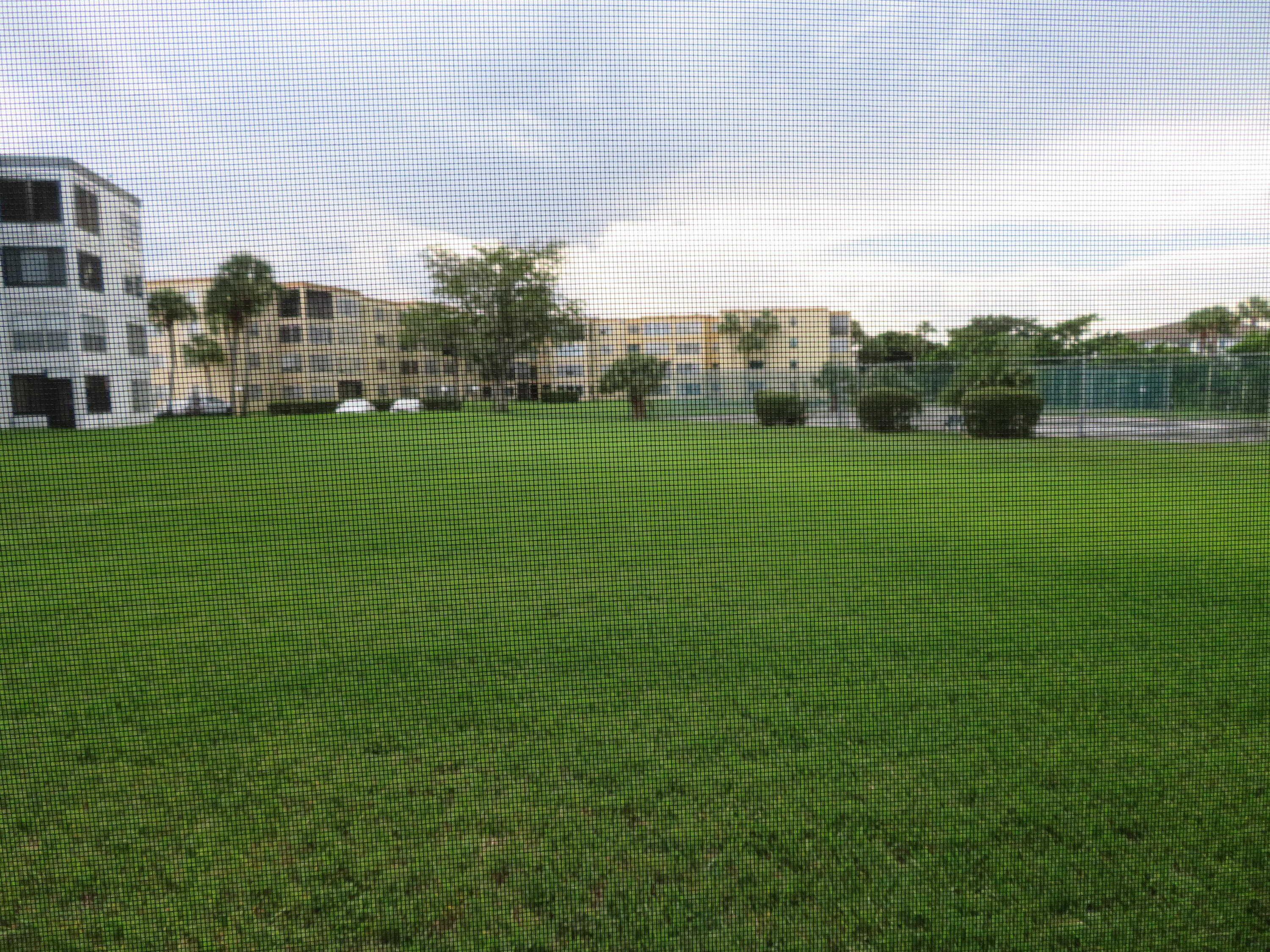 9233 Southwest 8th Street, Unit 117 Boca Raton, FL 33428 - Photo 37 of 37 a view of a green field
