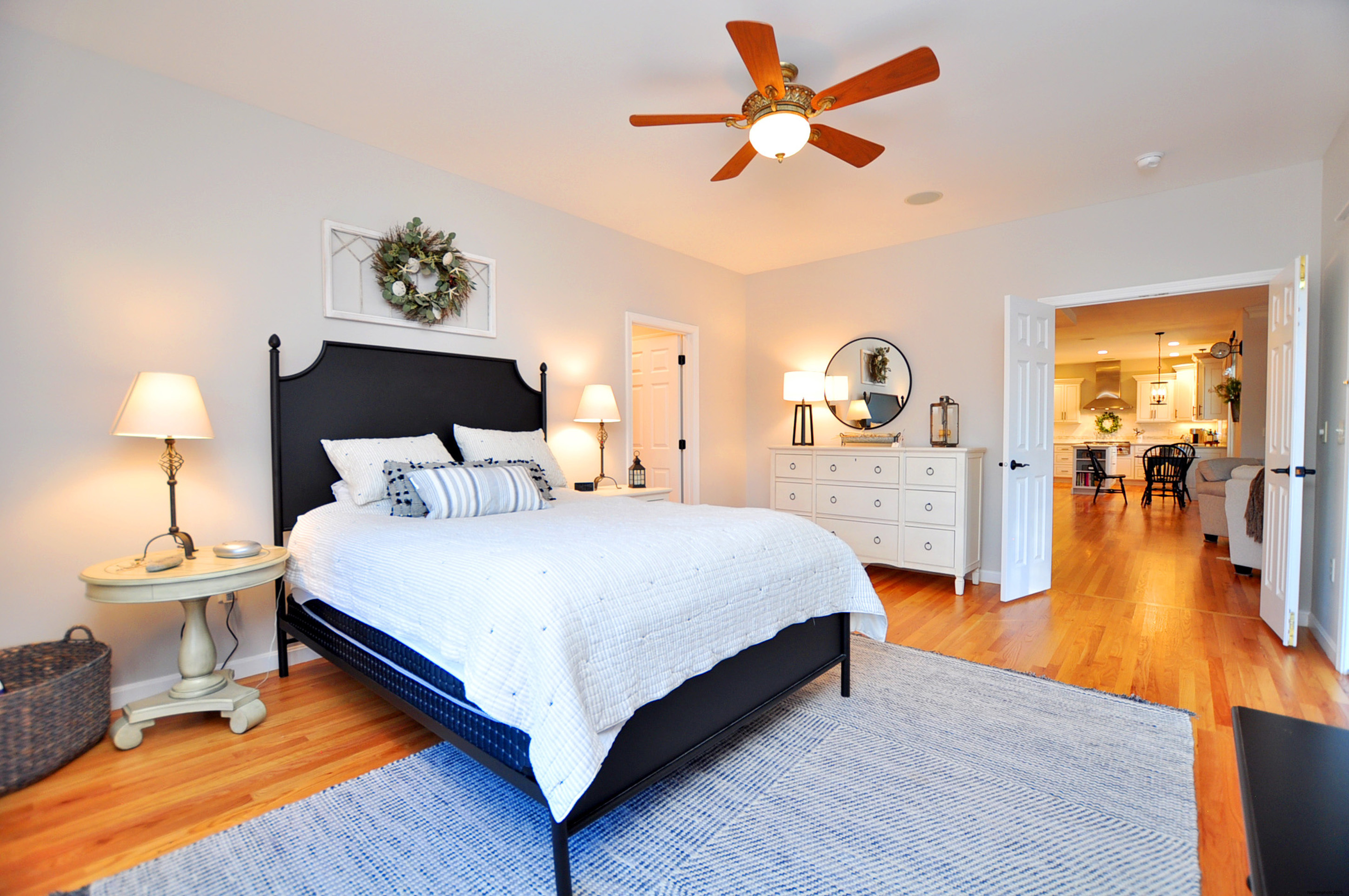 23 Dewberry Court, Unit 23 Suffield, CT 06078 - Photo 21 of 40 a bedroom with a bed and a chandelier