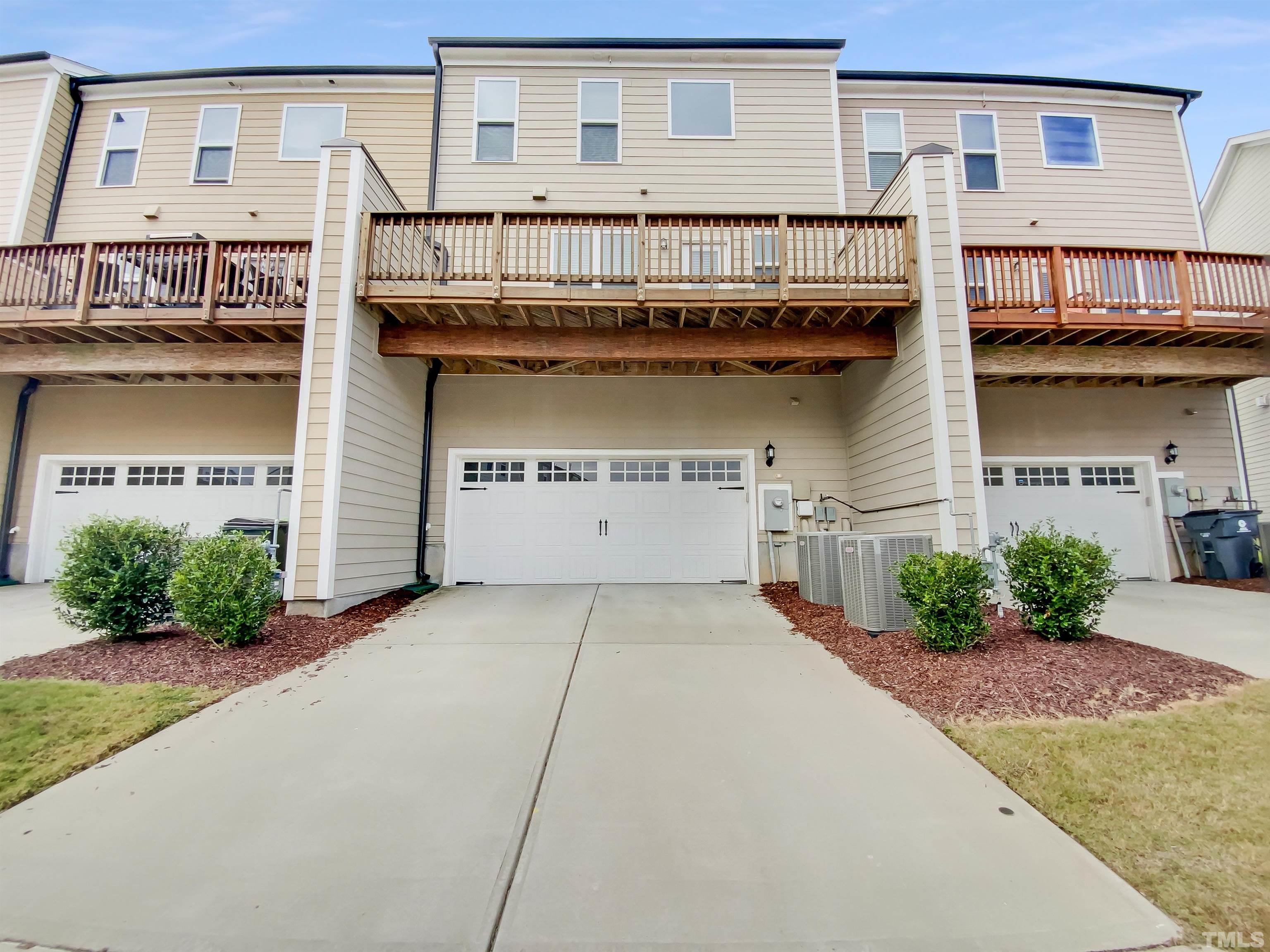 7006 Reedybrook Crossing Apex, NC 27523 - Photo 18 of 18 a view of a house with a porch
