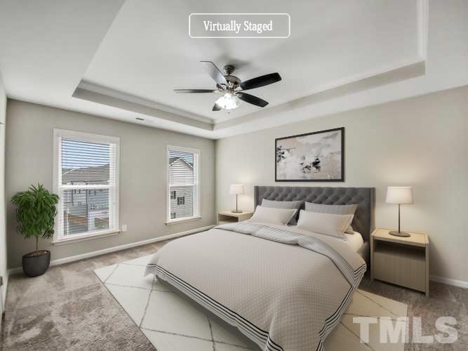 7006 Reedybrook Crossing Apex, NC 27523 - Photo 3 of 18 a bedroom with a large bed and a window