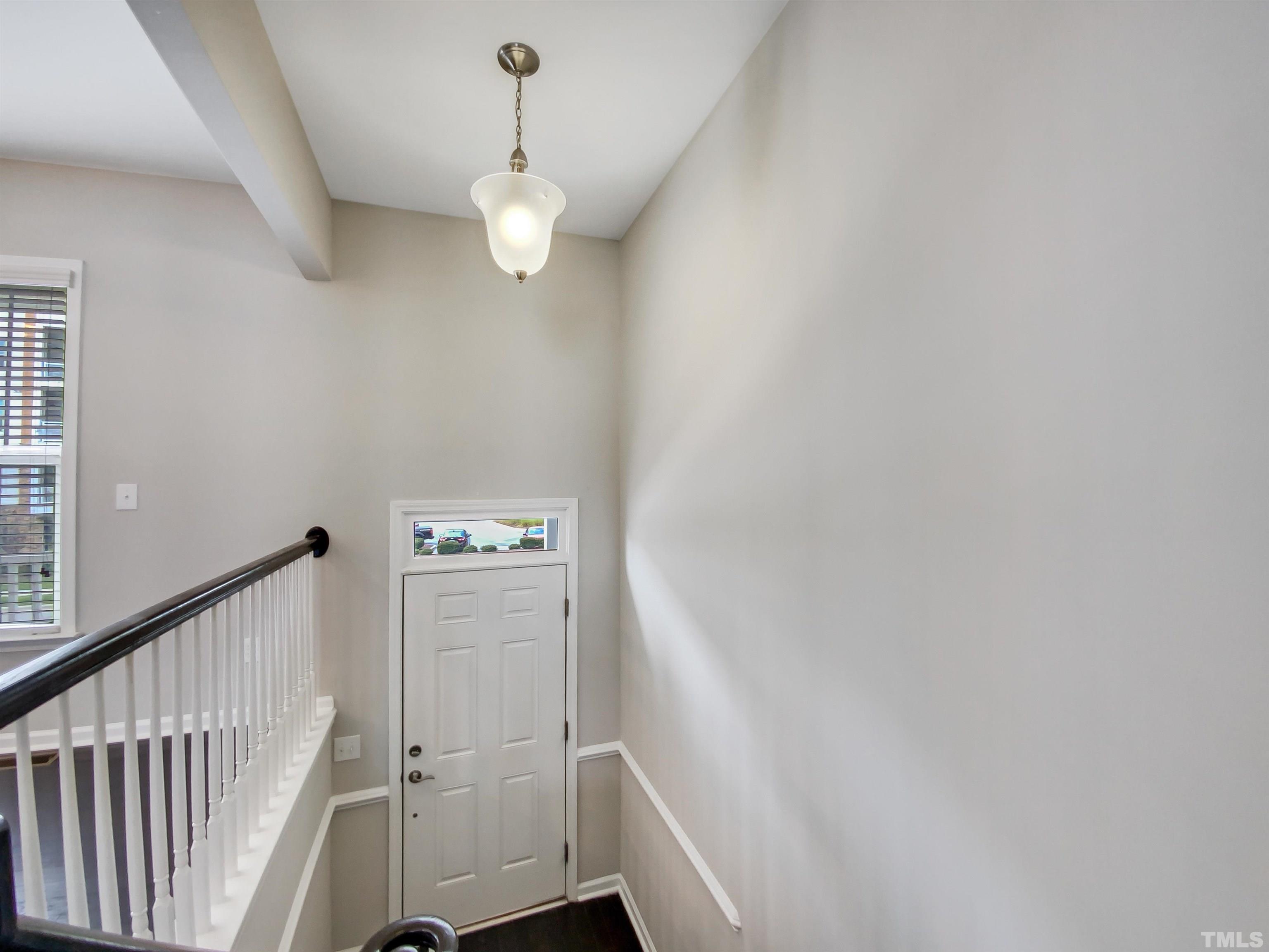 7006 Reedybrook Crossing Apex, NC 27523 - Photo 7 of 18 a view of an entryway with stairs