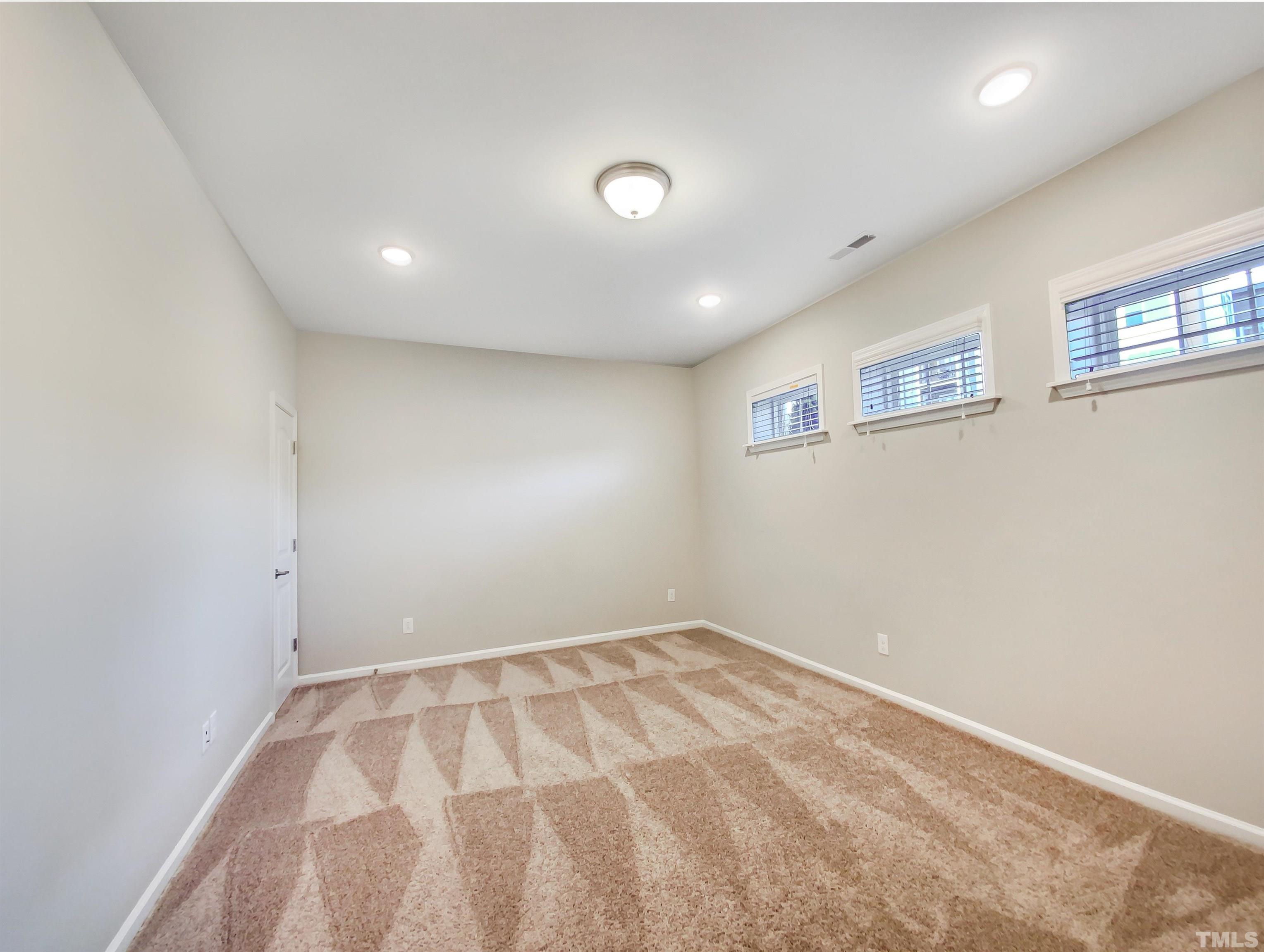 7006 Reedybrook Crossing Apex, NC 27523 - Photo 10 of 18 a view of an empty room