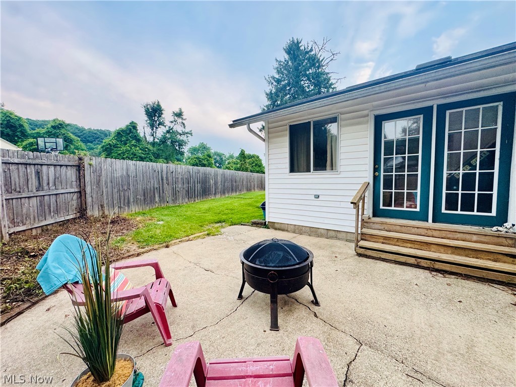 956 Braun Road Belpre, OH 45714 - Photo 6 of 44 PATIO IN BACK LEFT OF HOUSE SURROUNDED BY PRIVACY FENCE