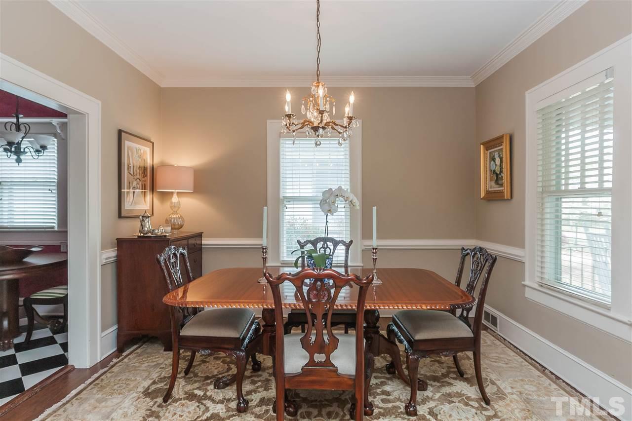 105 West Whitaker Mill Road Raleigh, NC 27608 - Photo 7 of 20 a view of a dining room with furniture window and wooden floor
