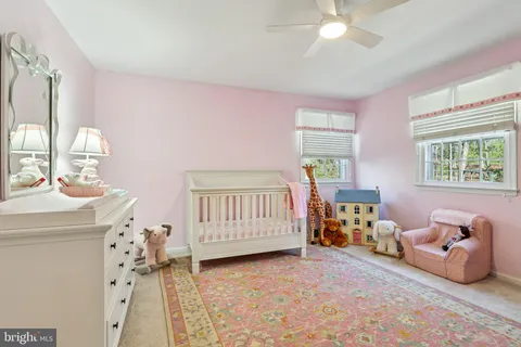 a view of a bedroom with a dresser