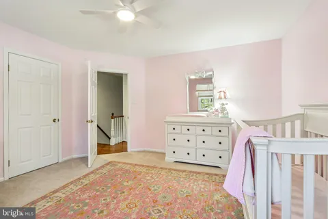 a view of a room with furniture and toys