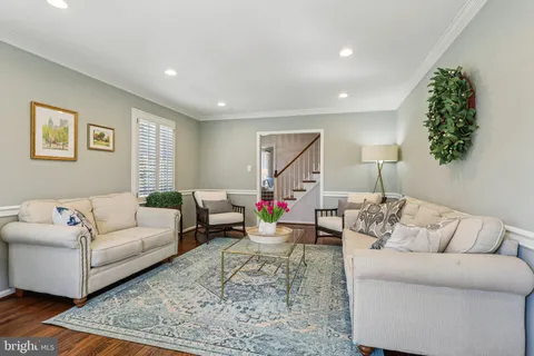 a living room with furniture and a couch