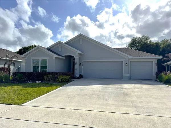 a house with yard in front of it
