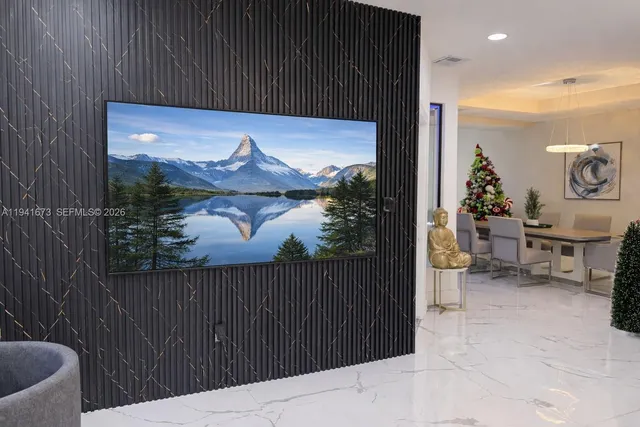 a kitchen with a white cabinets and appliances