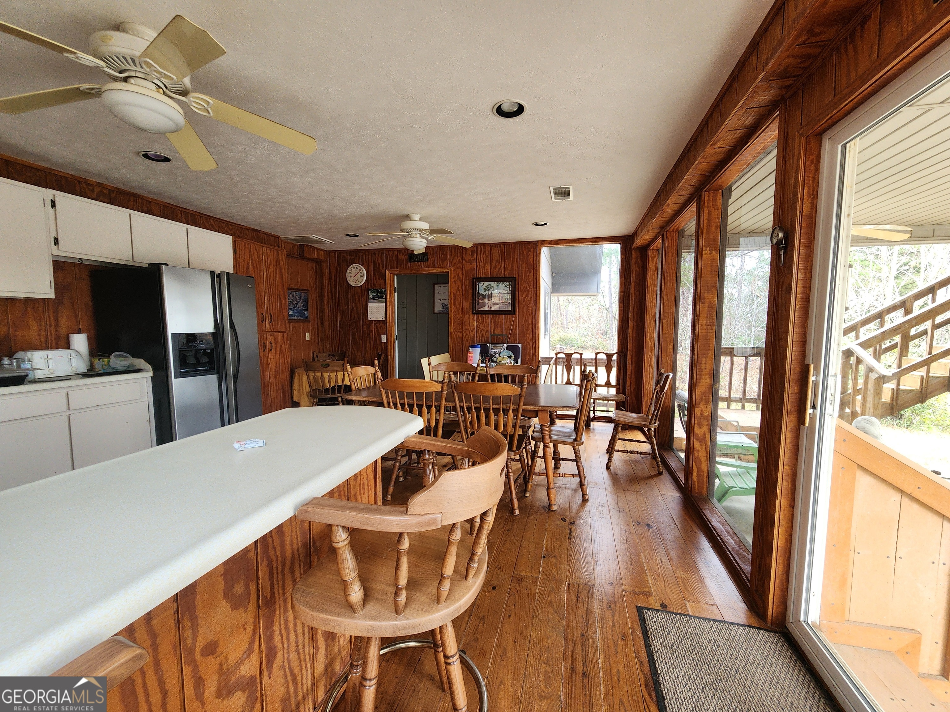 0 Hammond Powell Road Hazlehurst, GA 31539 - Photo 16 of 45 a view of a dining room with furniture window and wooden floor