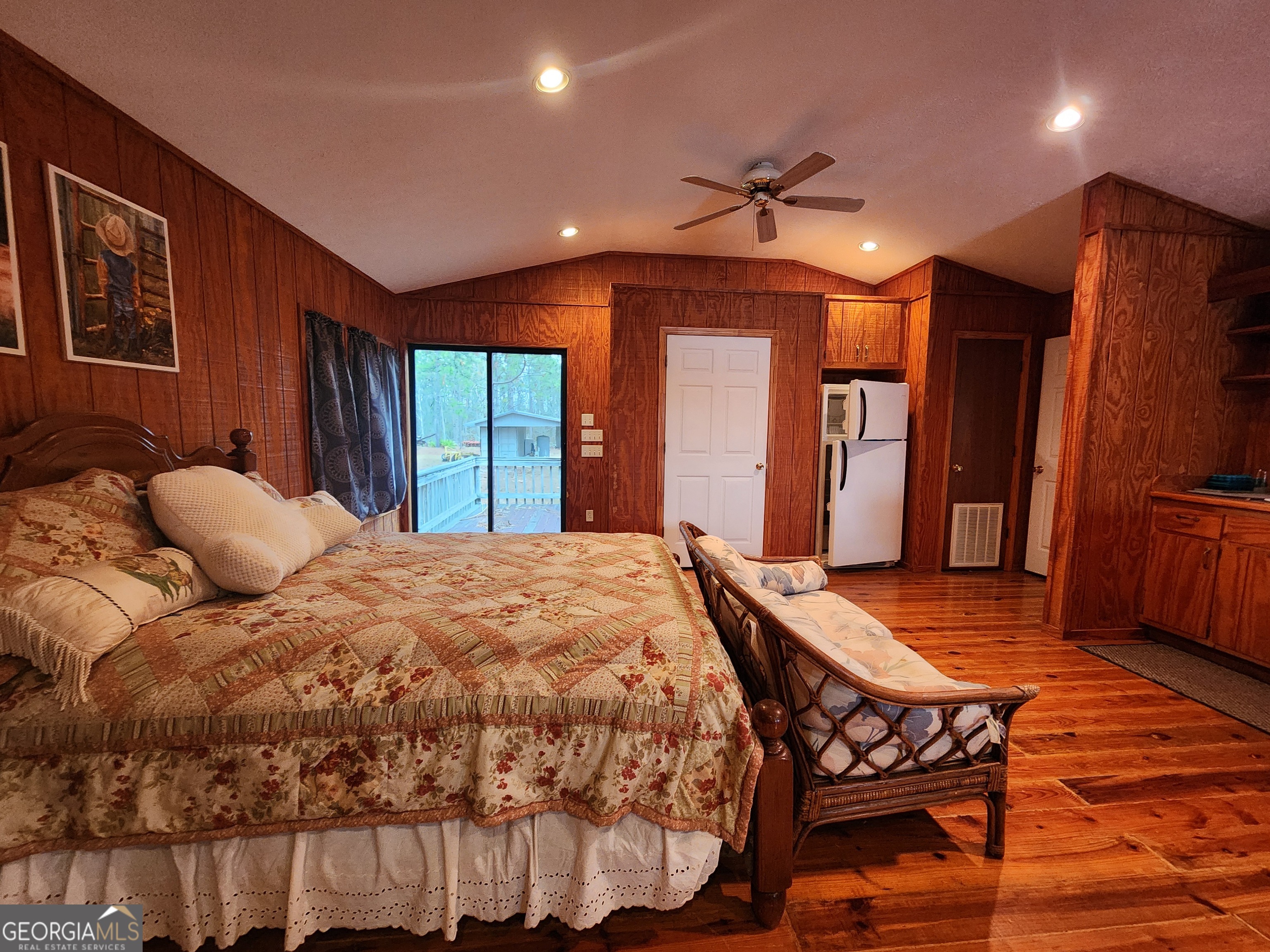 0 Hammond Powell Road Hazlehurst, GA 31539 - Photo 23 of 45 a bed sitting in a spacious bedroom next to a window