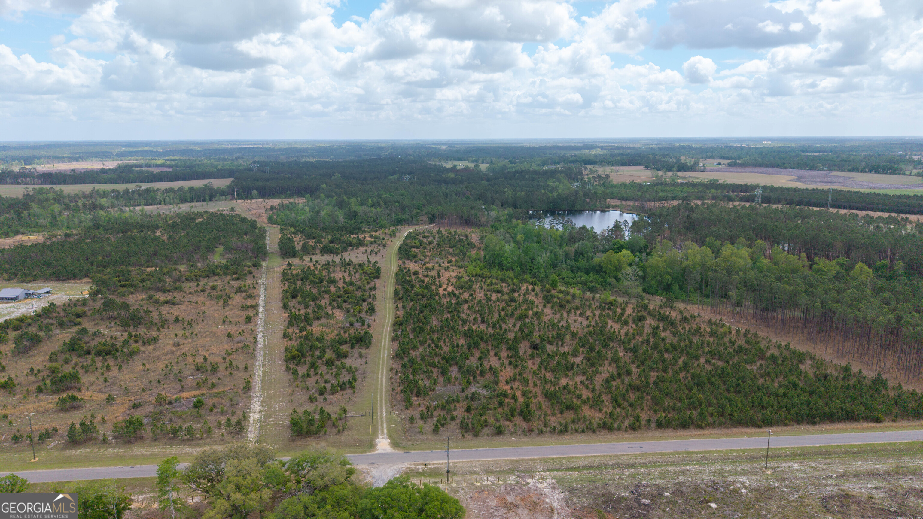 0 Hammond Powell Road Hazlehurst, GA 31539 - Photo 42 of 45 a view of a city with lots of trees