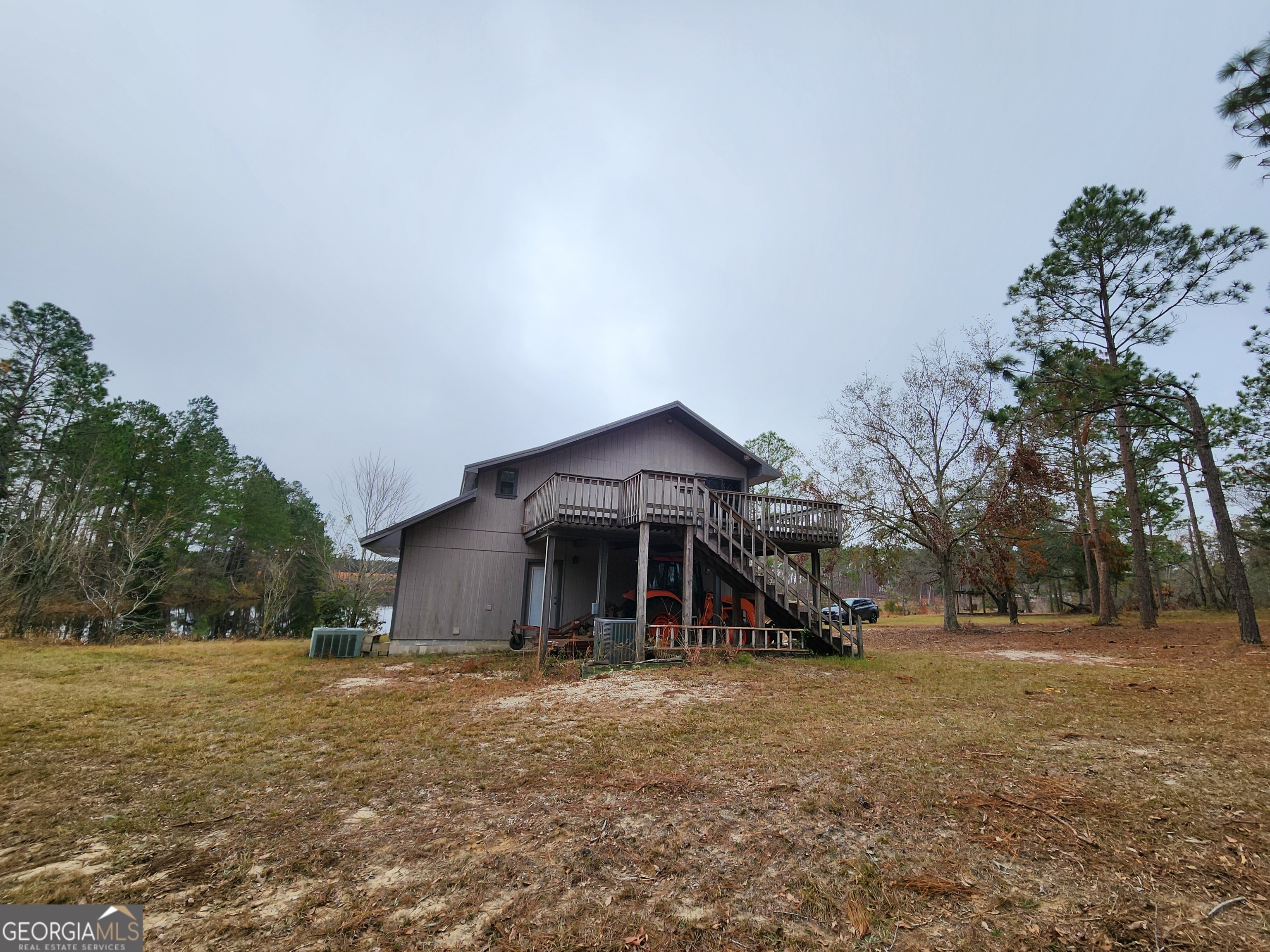 0 Hammond Powell Road Hazlehurst, GA 31539 - Photo 6 of 45 a front view of a house with a yard