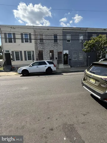 a car parked in front of a building