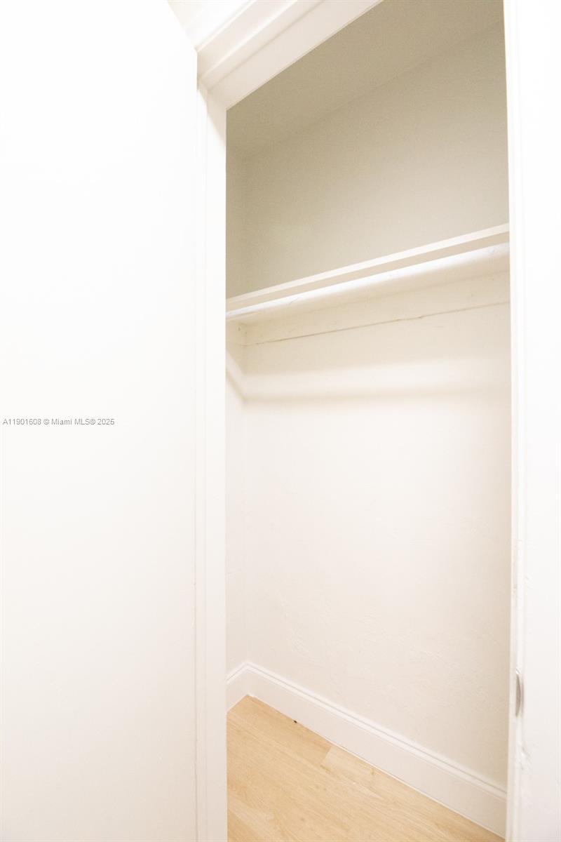 1880 Northwest 59th Way Sunrise, FL 33313 - Photo 20 of 27 a bathroom with a bathtub