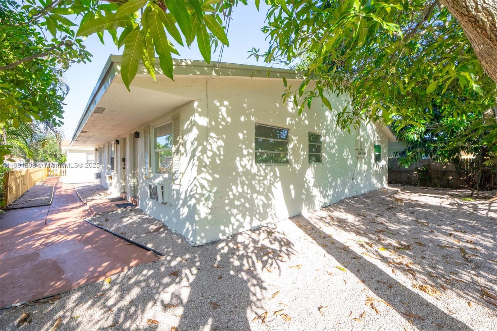 1880 Northwest 59th Way Sunrise, FL 33313 - Photo 21 of 27 a view of backyard of the house