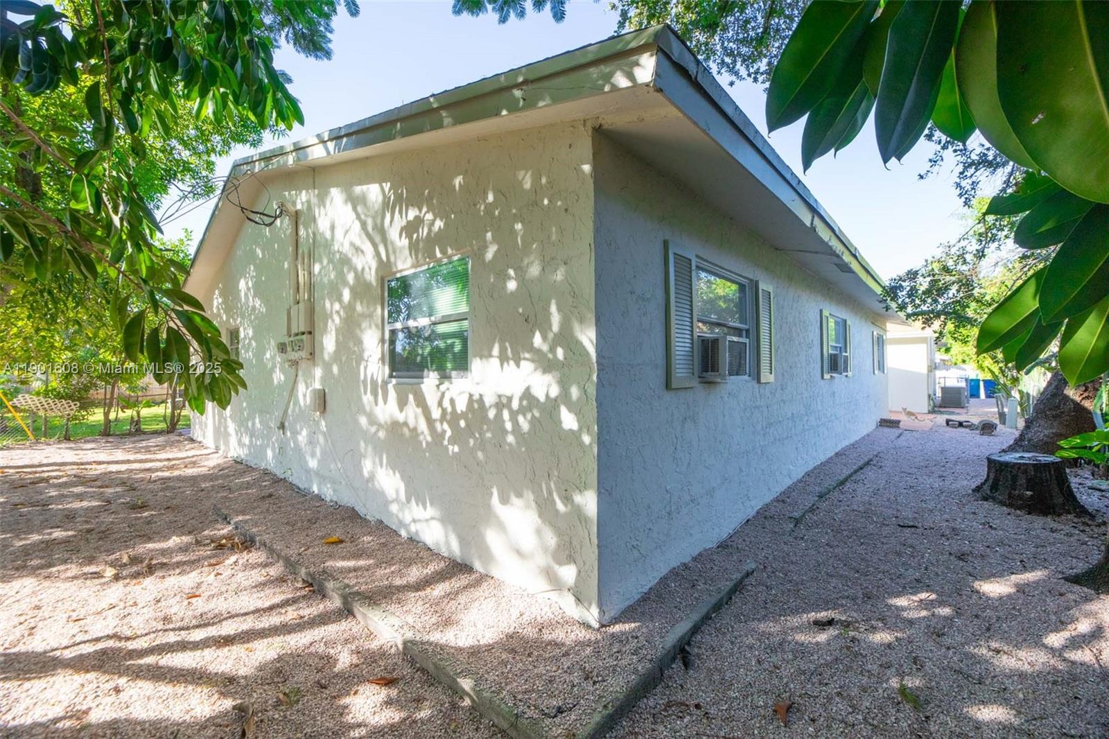 1880 Northwest 59th Way Sunrise, FL 33313 - Photo 23 of 27 a front view of a house