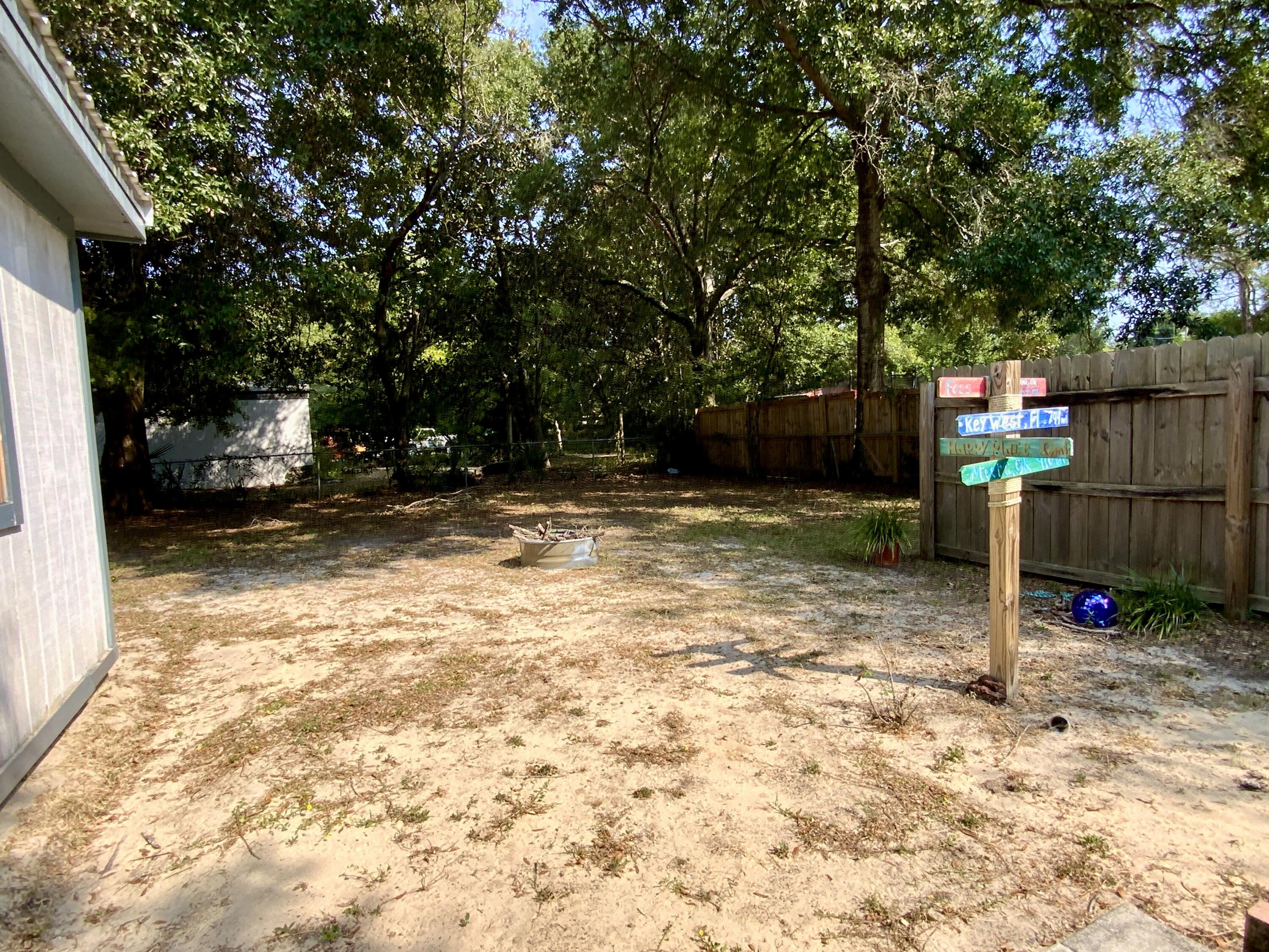 401 Gerold Street Fort Walton Beach, FL 32547 - Photo 18 of 20 a view of a backyard with a tree