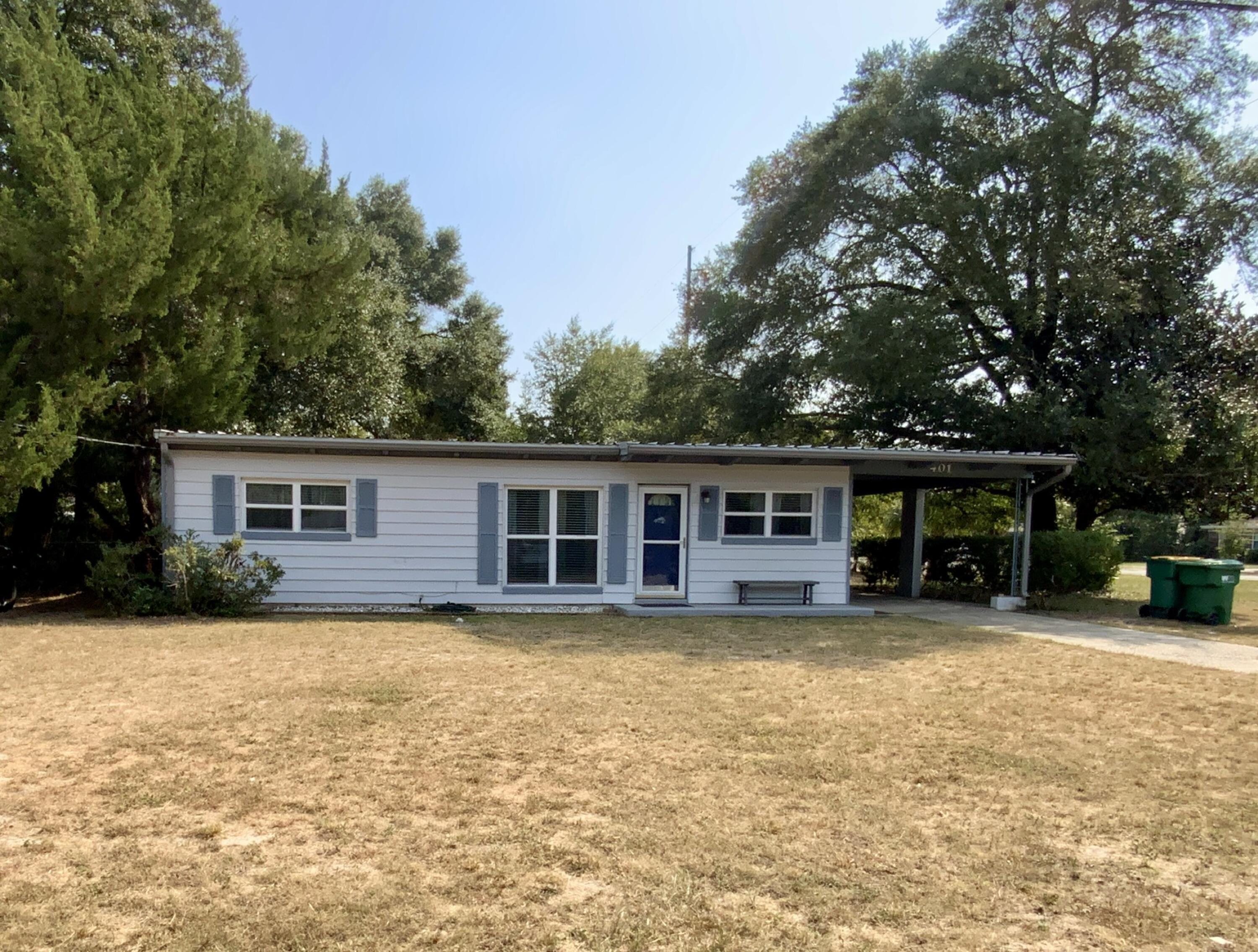 401 Gerold Street Fort Walton Beach, FL 32547 - Photo 2 of 20 a house that has a backyard
