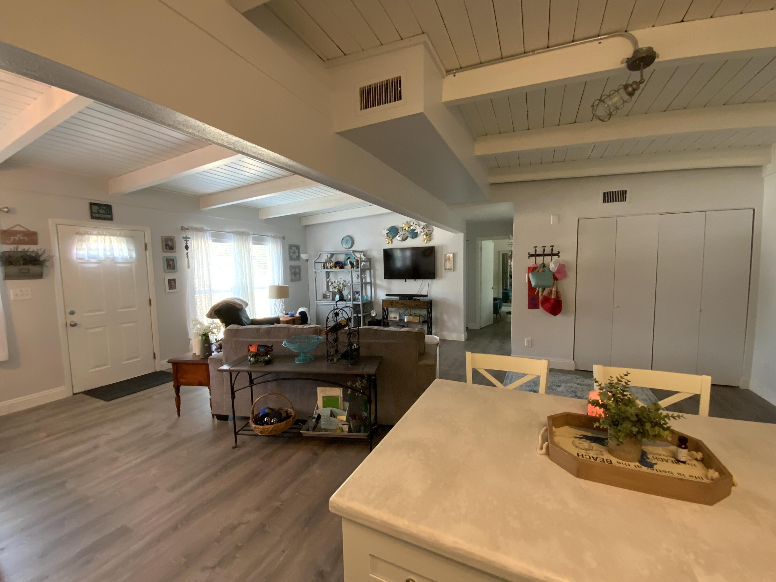 401 Gerold Street Fort Walton Beach, FL 32547 - Photo 7 of 20 a living room with furniture and a dining table