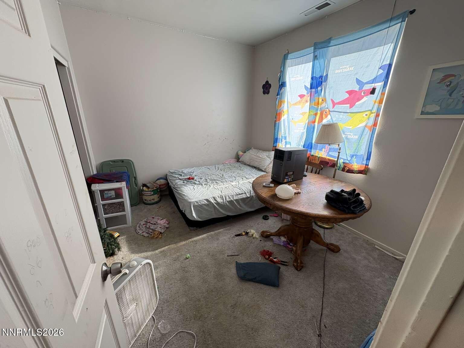 20888 White Rock Drive Reno, NV 89508 - Photo 18 of 18 a view of a workspace with furniture and toys