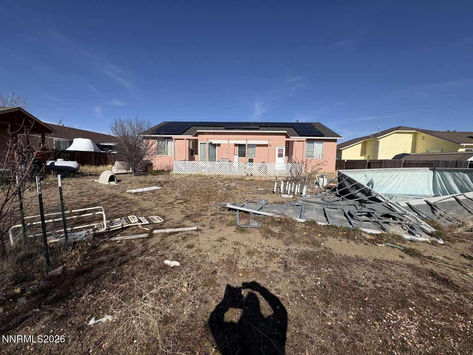 20888 White Rock Drive Reno, NV 89508 - Photo 3 of 18 a view of a house with a yard