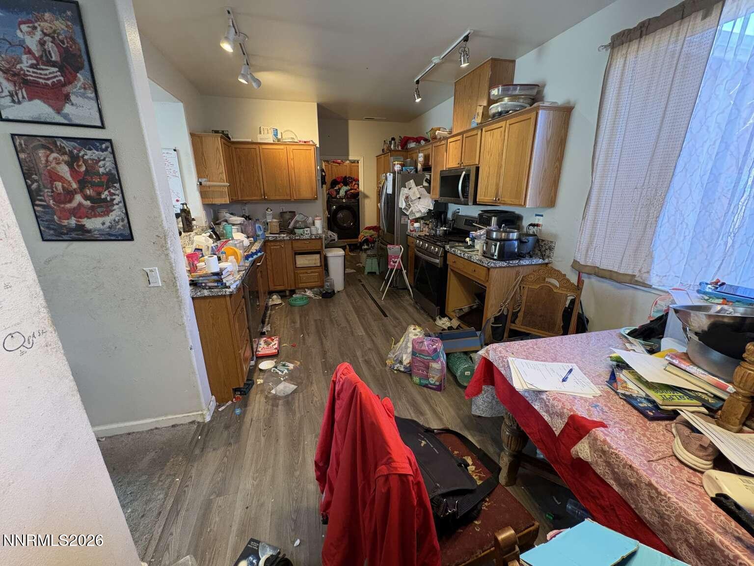 20888 White Rock Drive Reno, NV 89508 - Photo 6 of 18 a view of a workspace with furniture and toys