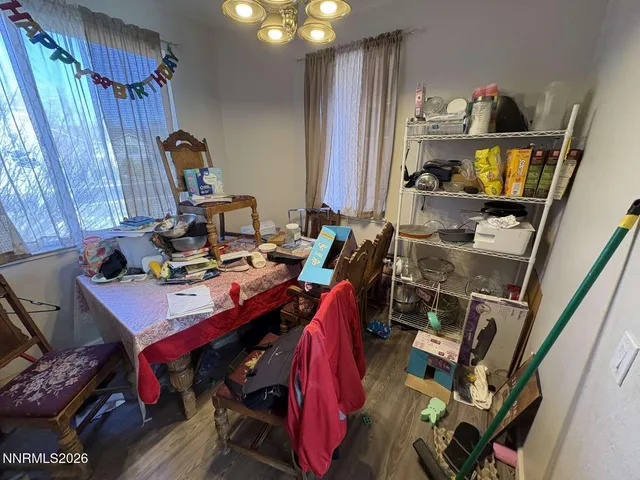 a room with furniture and a flat screen tv