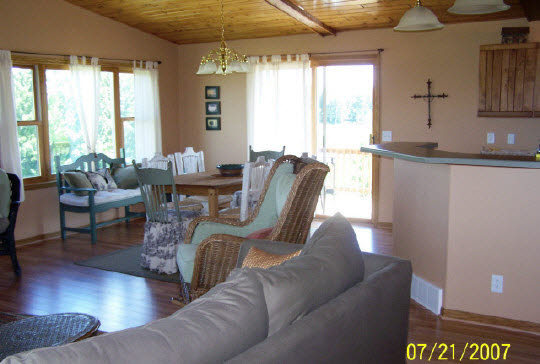 19-11 Timber Ridge Road Lake Carroll, IL 61046 - Photo 3 of 6 a living room with furniture and a large window