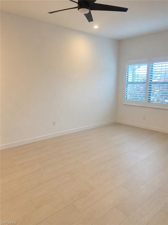 14866 Loggerhead Drive Naples, FL 34120 - Photo 8 of 16 an empty room with a window