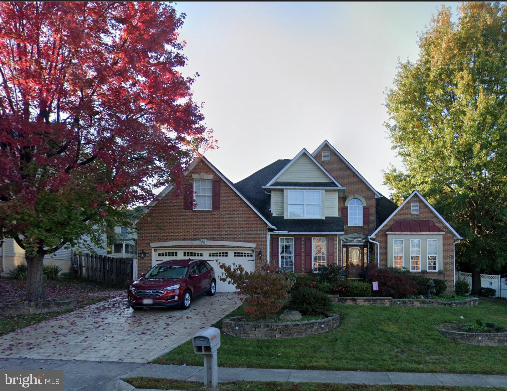85 Basalt Drive Fredericksburg, VA 22406 - Photo 1 of 14 a front view of a house with garden