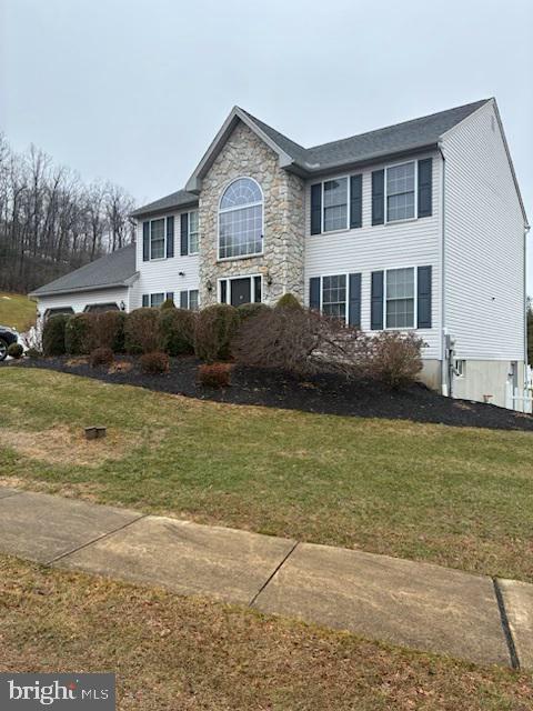 914 Kate Drive Sinking Spring, PA 19608 - Photo 1 of 1 a front view of a house with a yard