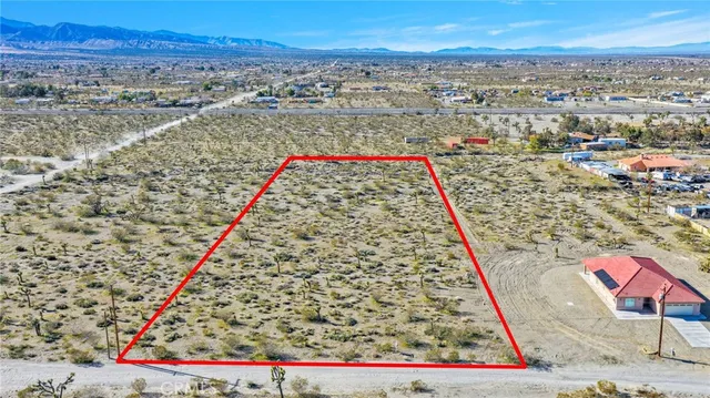 an aerial view of beach and residential houses