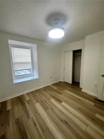 a view of a bathroom with a sink and mirror