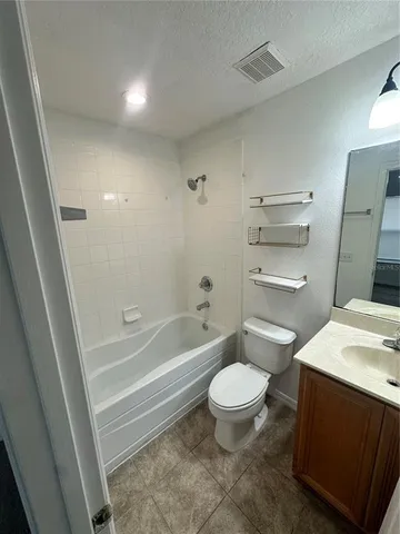 a view of a room that has a window