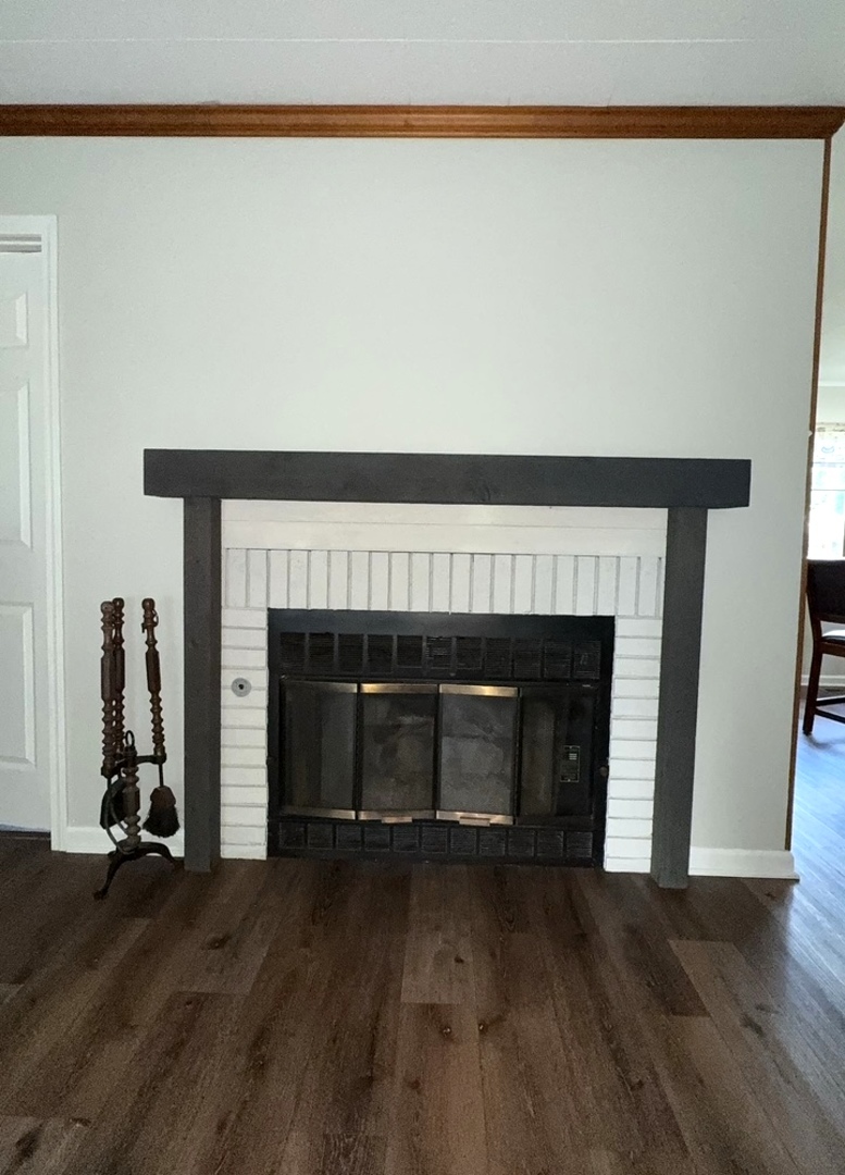 5199 Elmwood Road Oak Forest, IL 60452 - Photo 6 of 30 a living room with a fireplace