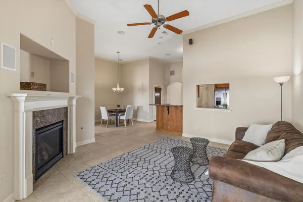 a kitchen with granite countertop a sink cabinets and stainless steel appliances