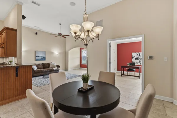 a view of a hallway with chairs