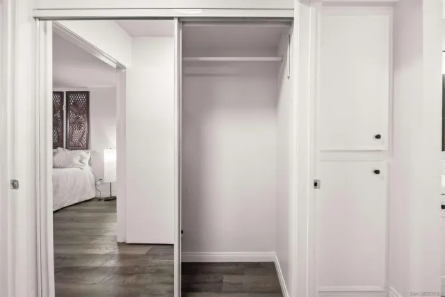 a view of a bedroom from a hallway