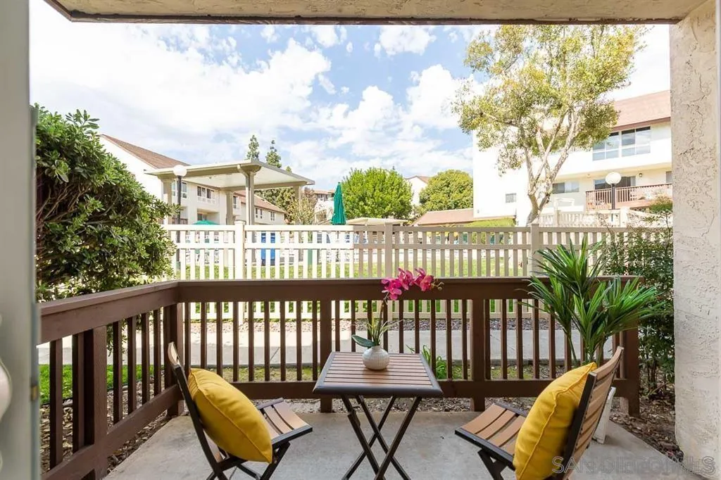 6191 Rancho Mission Road, Unit 103 San Diego, CA 92108 - Photo 13 of 28 a view of a chairs and table in the balcony