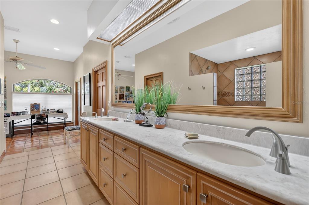 16238 East Shirley Shores Road Tavares, FL 32778 - Photo 24 of 48 a bathroom with a sink and a mirror