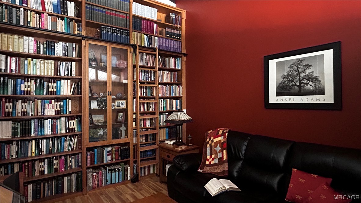 872 Sierra Vista Drive, Unit 9 Twin Peaks, CA 92391 - Photo 2 of 23 a book shelf with a book shelf