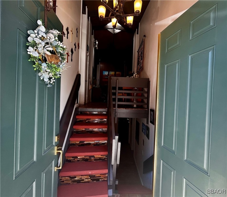 872 Sierra Vista Drive, Unit 9 Twin Peaks, CA 92391 - Photo 4 of 23 a view of stairs and flowers in a room