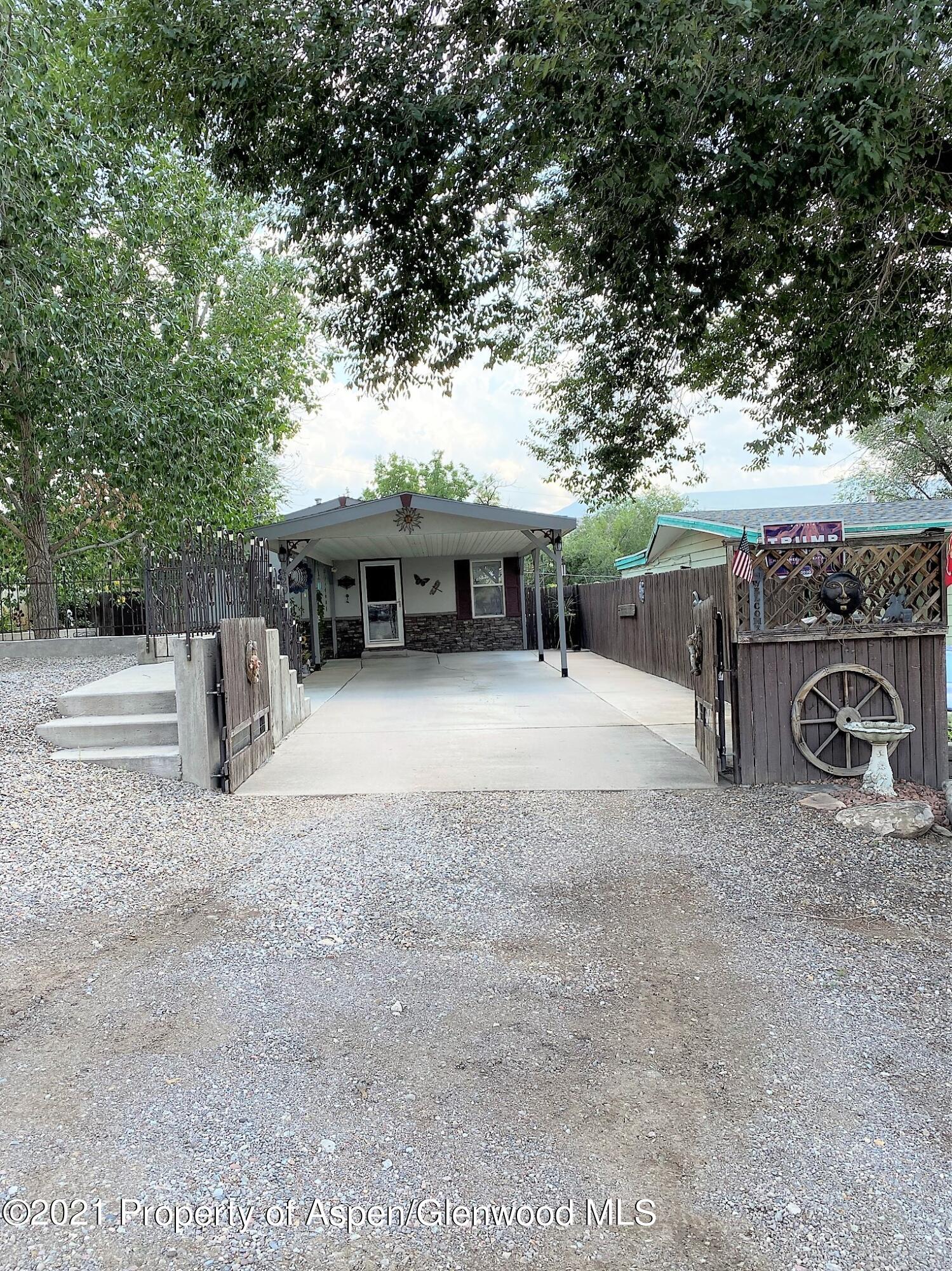 429 East 4th Street Rifle, CO 81650 - Photo 4 of 29 a view of a house with a outdoor space and sitting area