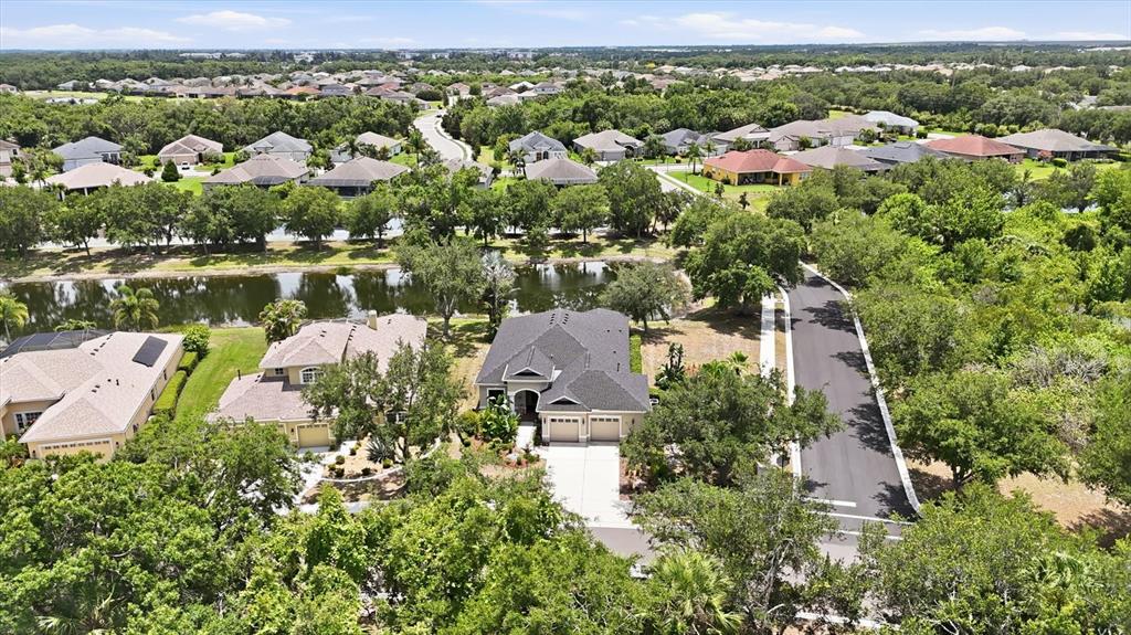 428 Snapdragon Loop Bradenton, FL 34212 - Photo 31 of 33 an aerial view of residential houses with outdoor space and river