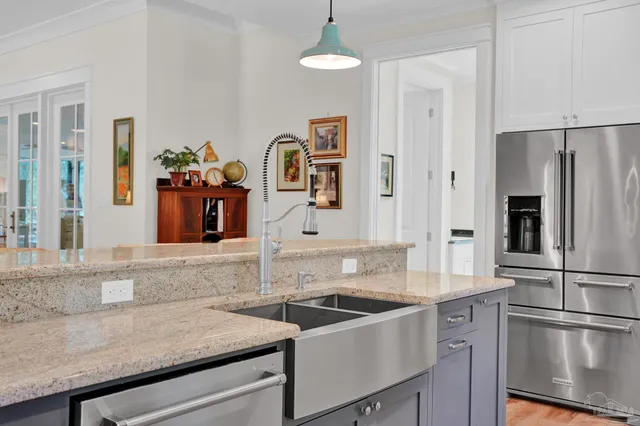 a room with furniture and a potted plant