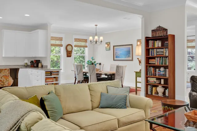 a bed room with a bed and a ceiling fan
